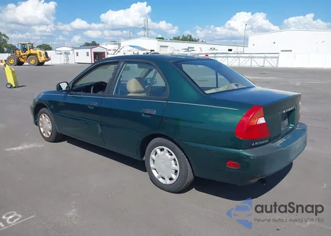 2000 Mitsubishi Mirage De z USA, uszkodzony, nr VIN JA3AY26C1YU012087